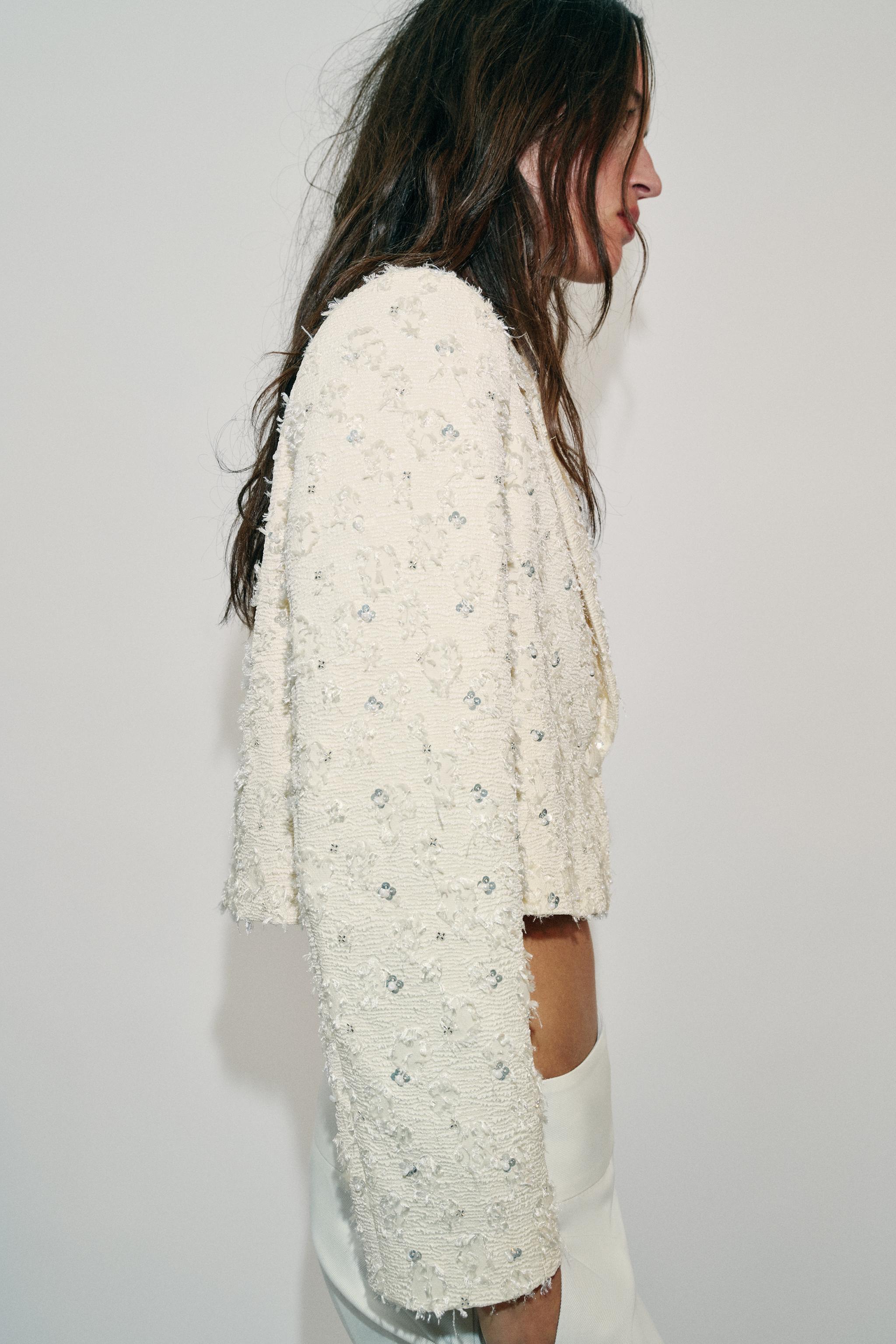 VESTE COURTE EFFRANGÉE À FANTAISIE
